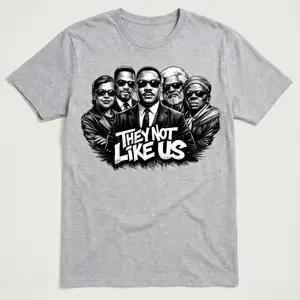 They Not Like Us Unisex Tee - Bold White Lettering on Black, Stylized Figures in Dark Suits, Modern Streetwear Aesthetic, Perfect for Bold and Stylish Looks