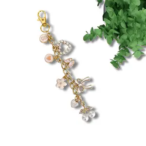 Clutching Pearls Personalized E-reader Chain Bookish Clip-On Accessory for Kindle Tablet or Other Device Pearl Hearts, Pearl Cherries, Bows and Personalized Initial. All White and Gold