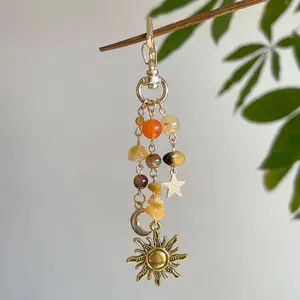 A Geometric Star And Moon Keychain, Featuring a Simple Pastoral Style with an Irregular Stone Design, Perfect for Hanging on a Backpack., Keychain Pendant