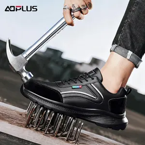 Black-faced steel-toe safety shoes with anti-slip and anti-crush features, highly durable and wearable, industrial-grade safety protection shoes.