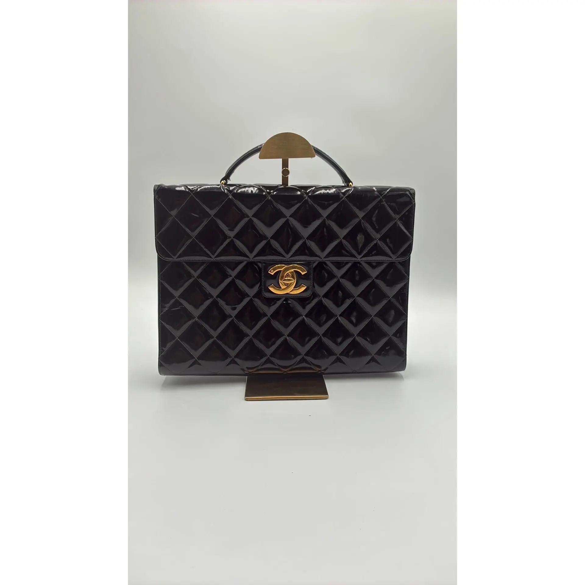 Pre-owned CHANEL Leather Luxury Bags & Accessories Matellase CocoMark Patent Briefcase, Black Date Code: NODC04272601 Entrupy ID: QTBJC7D