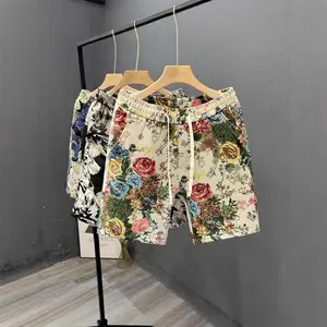 2025 graffiti casual shorts men's summer new ruffian handsome trendy brand beach pants men's straight five-point pants versatile large pants