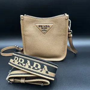 Pre-owned PRADA Grained calfskin leather Crossbody Bags Mini Daino Soft Leather Hobo Crossbody Bag Caramel color