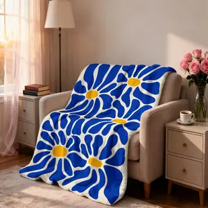 1 piece of Klein blue daisy blanket rice white background blue petals yellow heart flower printed flannel blanket is soft and comfortable. Suitable for sofa camping and other occasions
