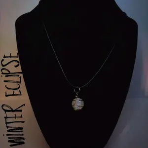 Winter's Eclipse Necklace - Elegant Silver Pendant with Unique Design for Stylish Outfits