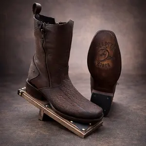 CUELLO DE TORO - Brown Leather Boots with Zipper Closure and Embossed Sole Design