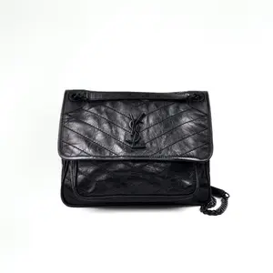 Pre-owned Yves Saint Laurent · Shoulder Bags YSL Saint Laurent Niki Medium Bag in Black Crinkled Calfskin with Black Hardware