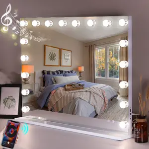 Large Hollywood Lighted Makeup Mirror with tempered glass, three-color lighting modes and adjustable brightness. Equipped with 18 dimmable makeup bulbs, tabletop/hanging Bluetooth speaker with music speaker, touchscreen, and USB charging port.