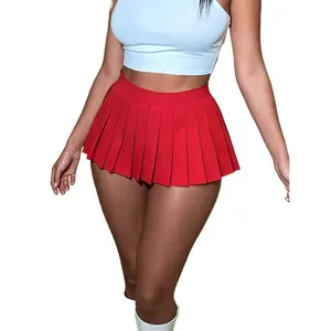 This high-waisted pleated mini skirt features a bold red color and sharp, evenly spaced pleats that create a flirty, flowy silhouette. The ultra-short length and high-rise waist accentuate curves, making it perfect for a Y2K, coquette, or night-out aesthe