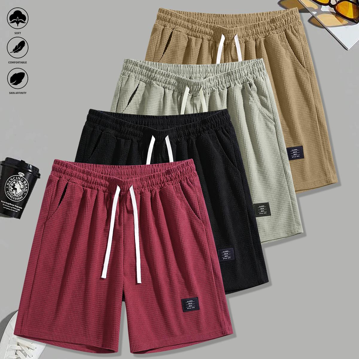 Set of 4 men’s summer new loose casual athletic shorts featuring an elastic waistband with drawstring adjustment, side pockets for convenient storage, knit fabric—ideal for running, workouts, outdoor activities, and everyday wear.