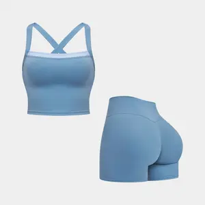 MFVIM women’s faux two-piece set featuring a cross cutout tank top with an attractive back design and high-waisted shorts that enhance the hips; outdoor running sportswear for women, suitable for yoga and fitness.