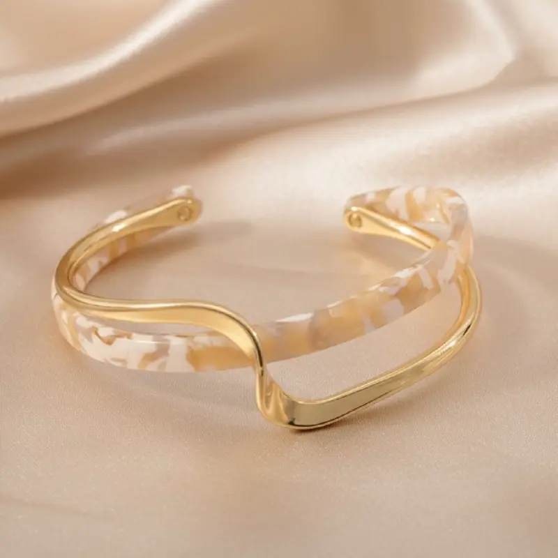 Reignllettes : Gold-Tone Acrylic Cuff Bracelet with Elegant Design for Fashion Accessories