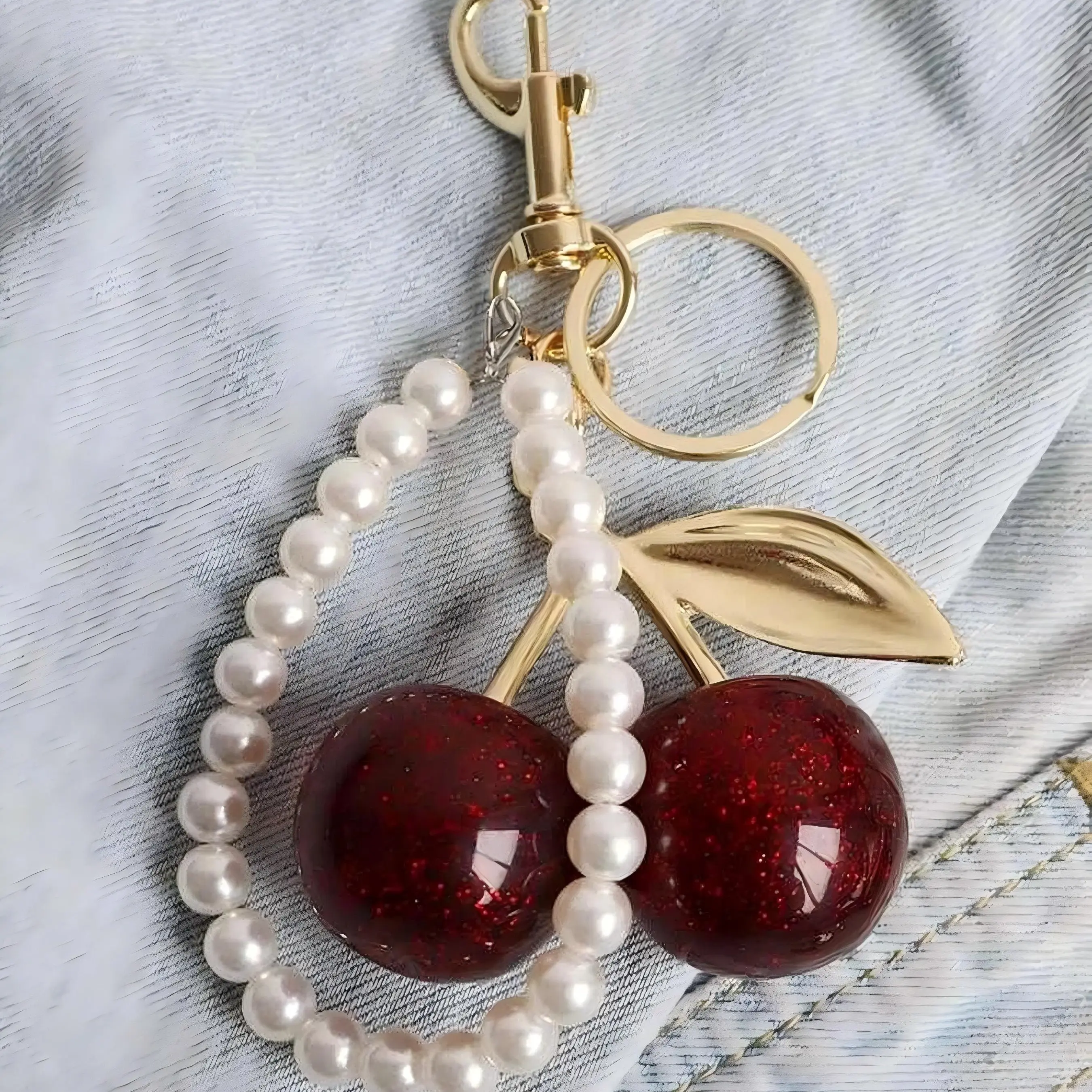 Cute cherry design keychain Stylish metal keychain , bag charm, birthday gift, holiday gift Includes hook and pearl string Delicate sparkling bag charm                   Cherry Gold Chain Handbag Charms  girly purse stuffers
