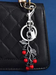 1PC Retro Cherry Branch Bag Charm, Red Bead Cherry + Vintage Gold/Silver Metal Leaves Keychain, With Lobster Clasp, Fits Bags/Keys/AirPods, Ideal For Graduation, Mother's Day & Birthday Gifts, Great Gift For Best Friends & Buddies, Chic & Unique Accessory