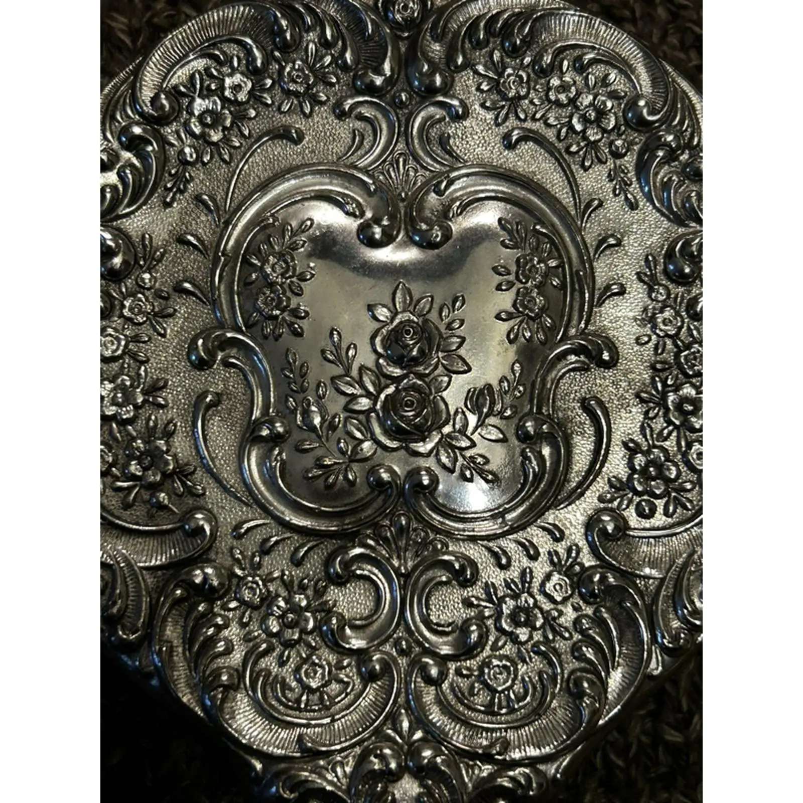Silver Tone Vintage Mirror with Intricate Floral Embellishments and Elegant Design