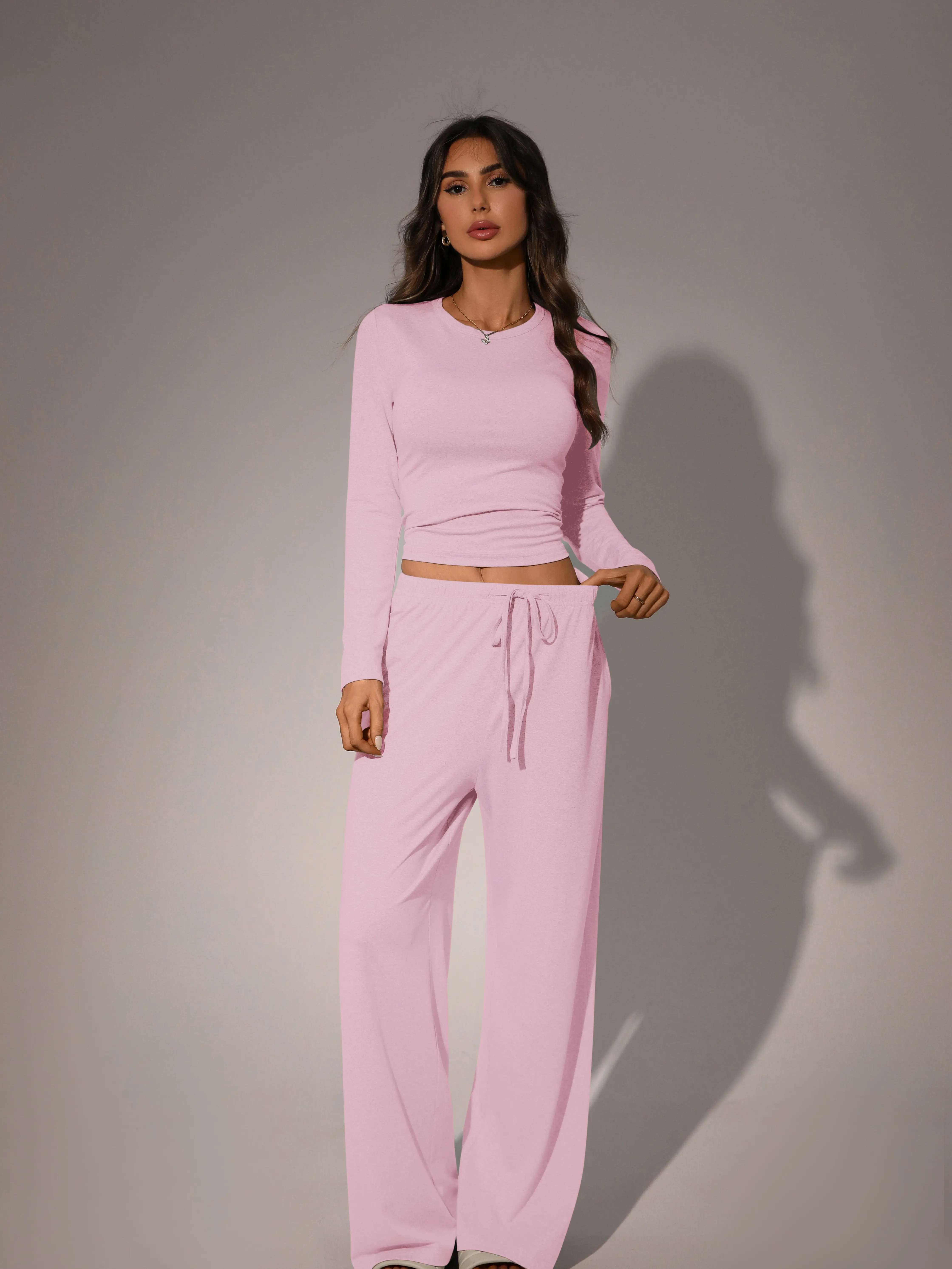 American hot-girl slim-fit long-sleeve backless drawstring top paired with high-waisted wide-leg pants, women’s casual two-piece set for going out with elastic waistband and pockets (multiple colors) Pink