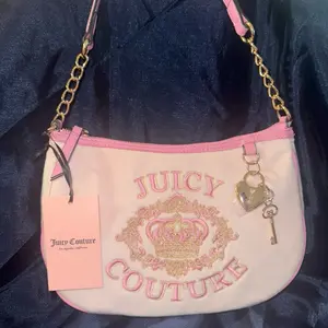 Juicy Couture Shoulder Chain Bag with Pink and Gold Accents and Heart Key Charm