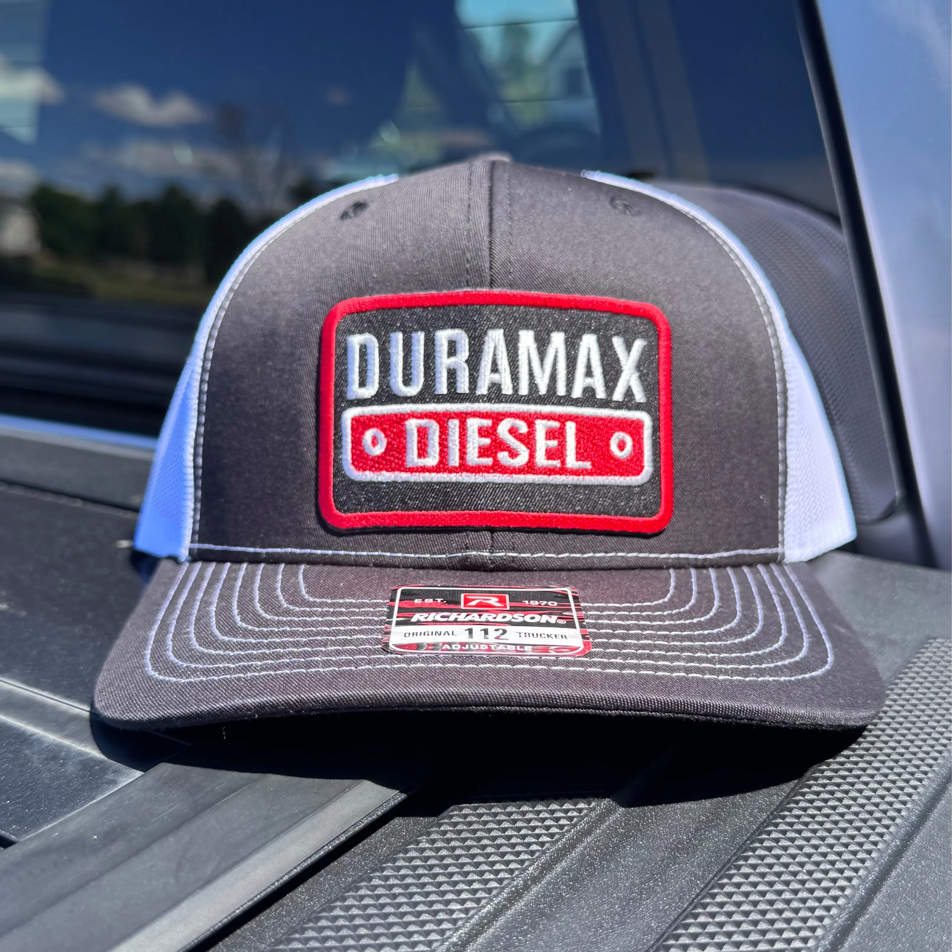 DMAX Diesel Charcoal Snapback Classic, Vintage Style Hat. One size fits all with an adjustable back strap.