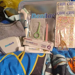 Denttach Starter Kit includes Denttach Seven Denttach Gold Denttach Clean Denture Brush Scissors Denture Case and more incredible value Oral Daily