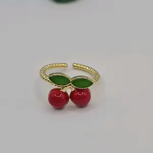Cherry Adjustable Ring with Red and Green Accents, Gold-Plated Finish, Elegant Design perfect date