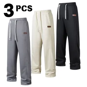 Men's solid color straight-leg sweatpants with an elastic drawstring and slant pockets, suitable for spring and autumn wear