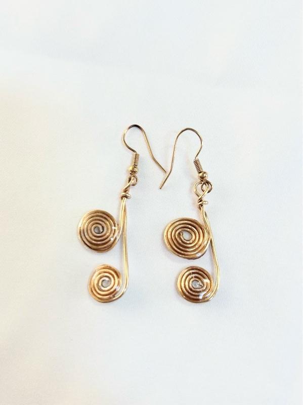 SCS-Golden Echo Spirals 1.5” Coated in Resin Earrings with Elegant Spiral Design and Gold Color Finish SCS-Golden Echo Spirals 1.5” Coated in Resin Earrings with Elegant Spiral Design and Gold Color Finish