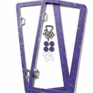 Set of two bling purple license plate frames.