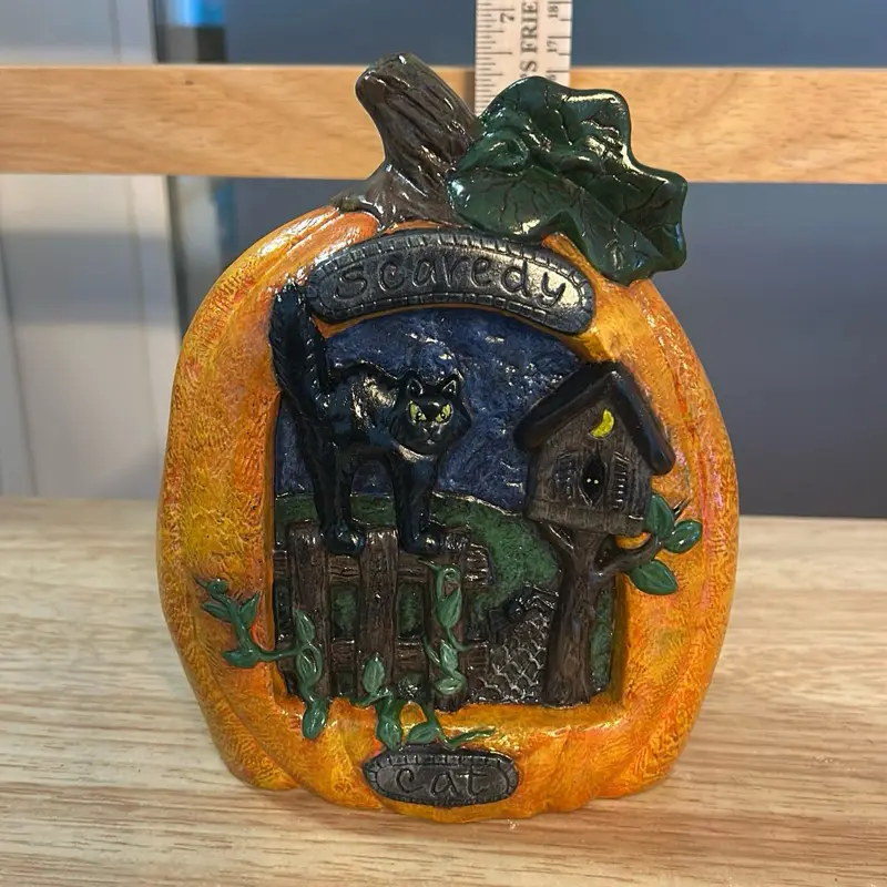 Hand painted ceramic pumpkin.