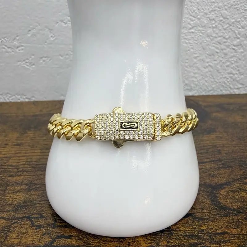 Pulsera Mónaco de 8” aproximadamente en oro laminado