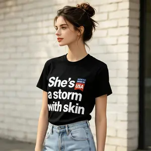 Women's Black "SHE'S A STORM WITH SKIN" T-Shirt | Strong Woman Statement Print | Patriotic USA Badge | Perfect Gift for Empowered Women