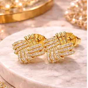 Aretes Nudo Elegante Oro Laminado 14K