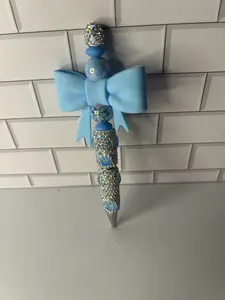 Light blue bow with bling shell pen