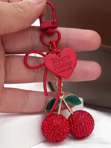 Red Rhinestone Cherry Keychain, Fashionable Alloy Keychain, Sparkling Red Cherry Pendant Paired With Green Leaves, Red Heart, And Bow Pendant, Made Of Alloy Material, Suitable For Fashion Enthusiasts, Valentine's Day Gift