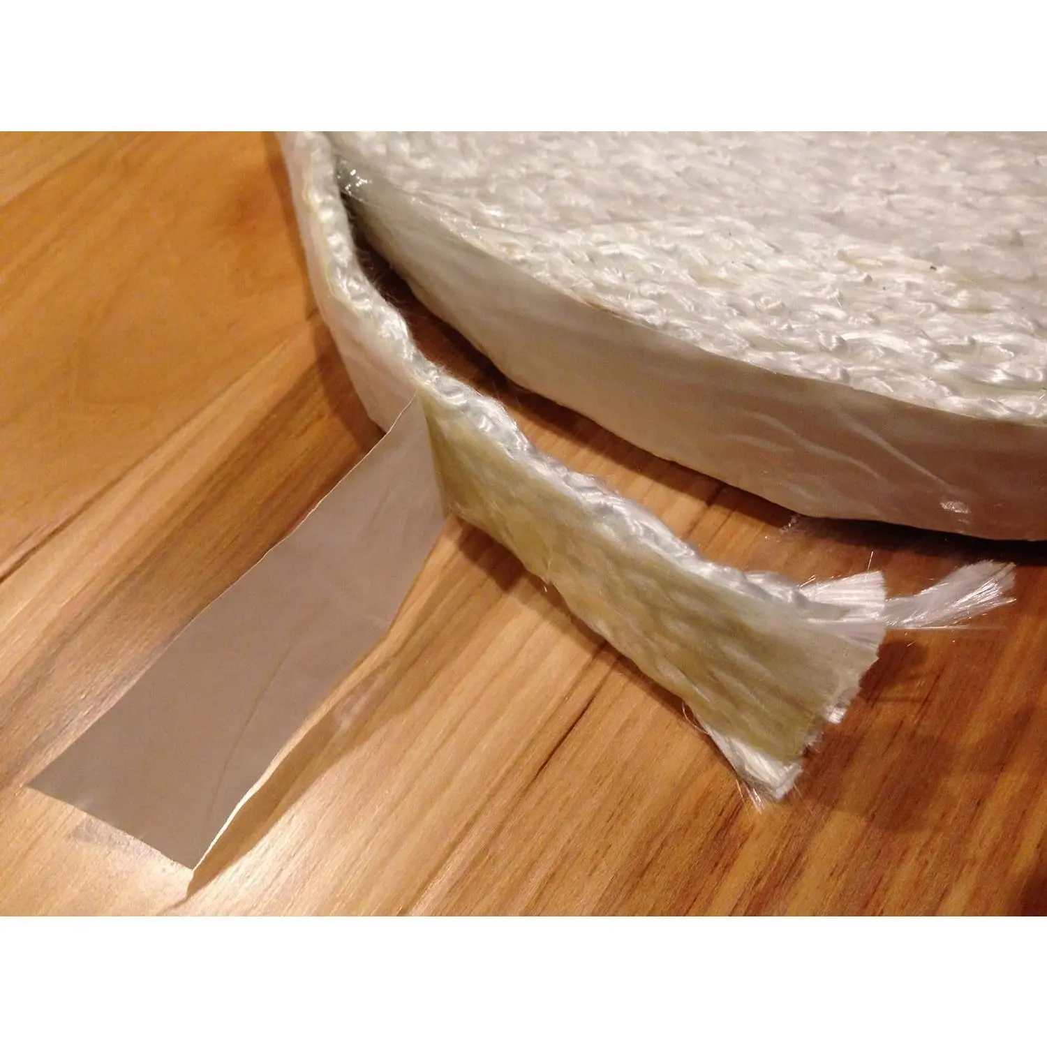 Adhesive-Backed Fiberglass Rope Seal for Wood Stove, Flat 1/4" x 1" Wide x 10 ft Roll Door Gasket