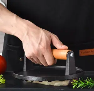 Barbecue grill meat press plate for making round hamburgers and steak grills. Iron plate for barbecue. Non-coated cast iron.
