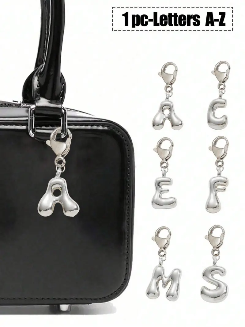 silver alphabet pendant stussy - TikTok Shop