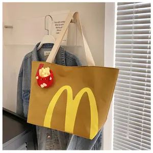 Classic Retro Canvas Tote Bag with Keychain Adjustable Shoulder Strap Spacious Interior Can Be Used as a Backpack Shoulder Bag or Crossbody Bag