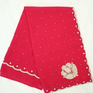 Pink Saree with Embellished Border and Intricate Floral Motif for Festive Wear