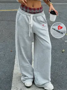 Y2K Baggy Grey Sweatpants Alert! 🔥 Plaid Waist + LA Heart Embroidery = Comfy Streetwear VibeOversized fit, drawstring waist & side stripes—your new go-to loungewear and OOTD staple. #ViralFashion #Athleisure #StreetStyle #TikTokFinds