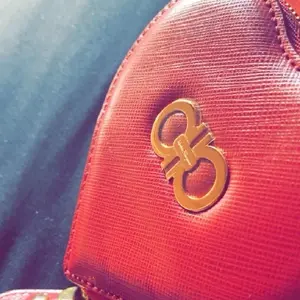 Salvatore Ferragamo heart shaped double Gancini clutch- Leather