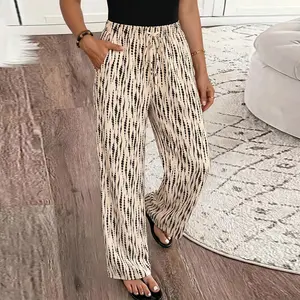 Women’s trendy wide leg pants with abstract water droplet pattern, soft and skin friendly summer drawstring long pants with pockets, lightweight, breathable, loose drape, suitable for everyday wear, commuting, vacations, and parties.