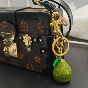 Creative Fruit Cute Pear Bag Keychain Pendant Stylish Playful Charm with Unique Design and Buckle Feature for Personalized Keys