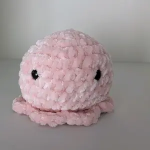 Handmade Crochet Octopus Plushie Soft Pink Cuddly Toy for Kids and Adults Unique Design Comfortable Material Great Gift