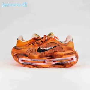 Daily lightweight platform trainer sneakers adopt seamless soft breathable knit mesh uppers, uniform burnt orange abstract print knit base with tinted pink air cushion pockets, perforated mesh for steady ventilation, flexible full air midsole