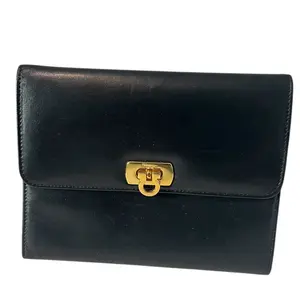 Pre-owned FERRAGAMO Leather clutches & wristlets FERRAGAMO: Black, Gancini Logo Clutch