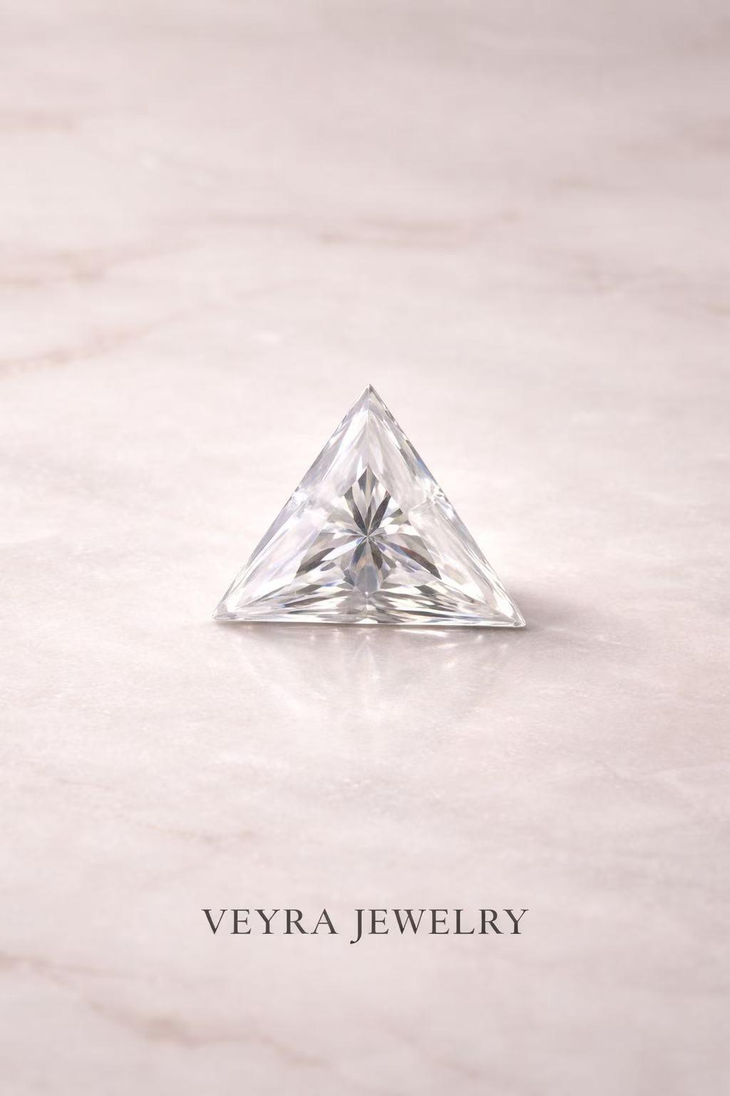 Triangle-shaped natural diamonds and sapphire diamonds come with certificates included.