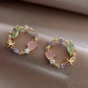 Colorful zircon flower earrings for women, fresh and sweet, cat's eye stone stud earrings, fashionable and high-end earrings wholesale.