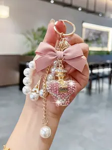 Creative Water Bottle Keychain, Fashion Bow Perfume Bottle Bag Charm, Elegant Pearl Chain Car Key Ring Gift Accessory