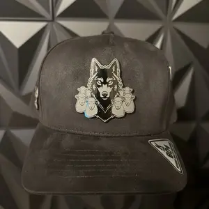 Alpha Caps El Malo del cuento color plate SnapBack Hat-
