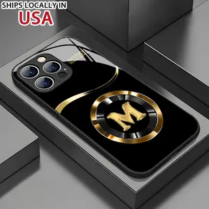A Durable And Attractive M-Shaped Golden Phone Case Designed for Various Iphone Models Including The 16 Series, 15 Series, 14 Series, And Older Versions Like The 11 And XR/XS/XS Max.